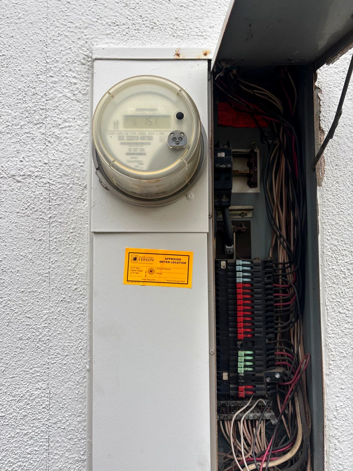 CompanyCam photo of an outdated Orange County electrical panel before replacement